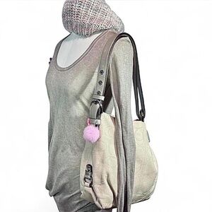 Coach Perforated Signature C Leather Hobo in Ivory with a Metallic Silver Strap